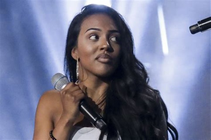 X Factor star Ash Holme looks completely unrecognisable four years after appearing with girlband NQ ·